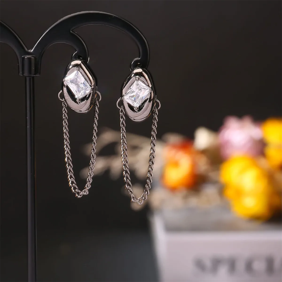 Crystal & Black-Tone Oval Tassel Drop Earrings