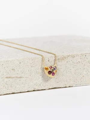 eroded disc necklace with rainbow sapphires