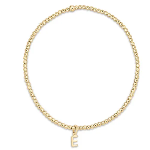 Gold Bead Bracelet A Charm