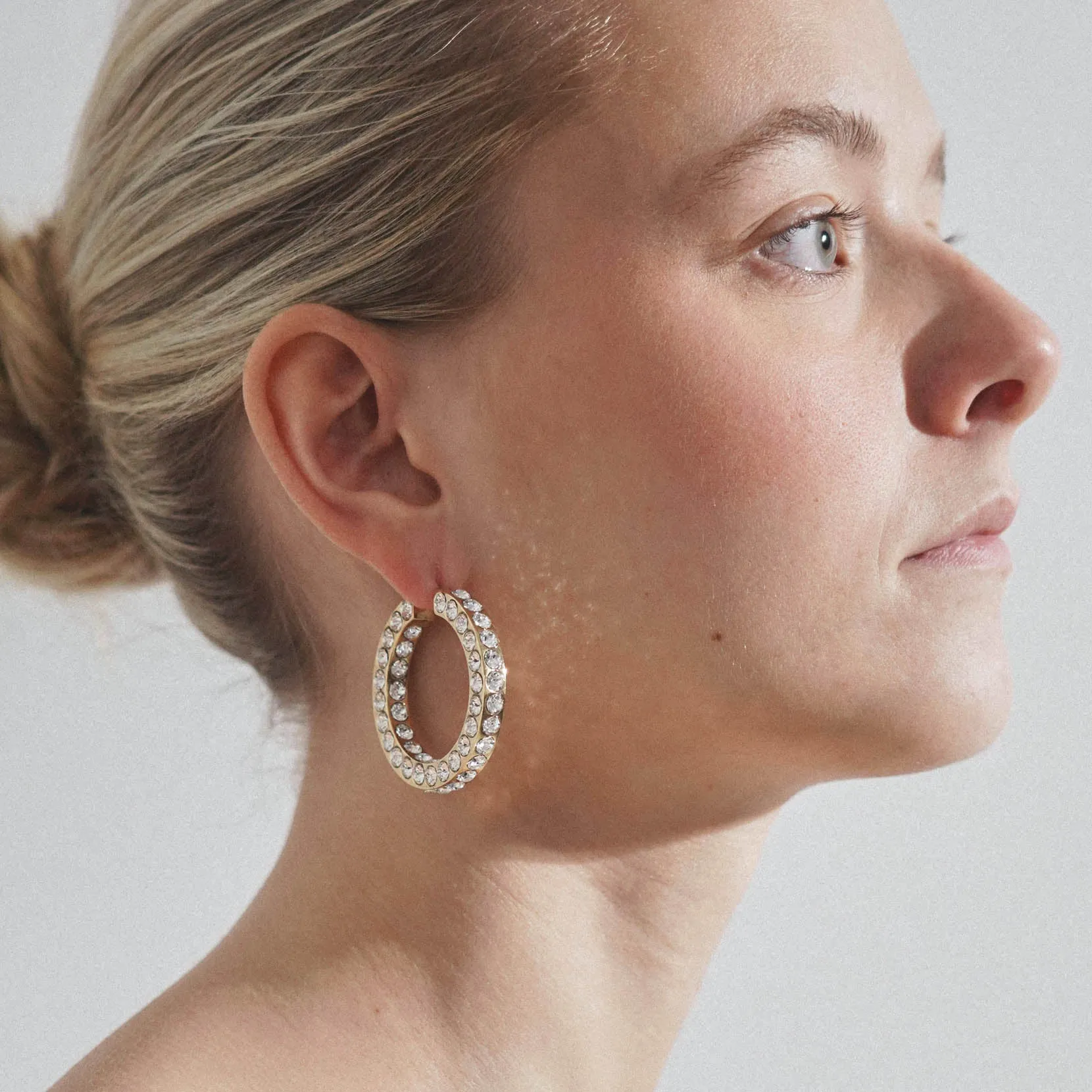 Jah hoop big white and gold crystal earrings