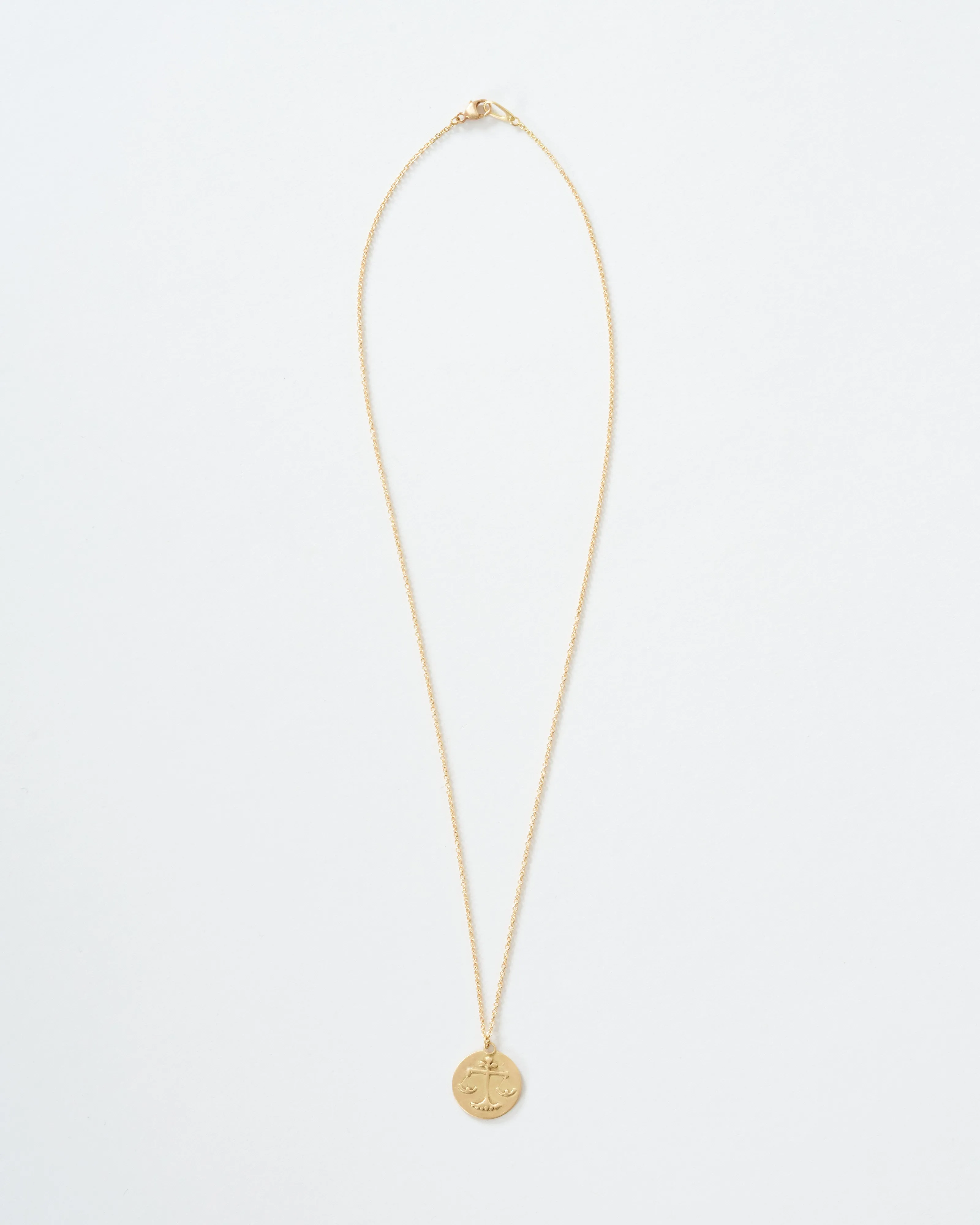 libra disc necklace