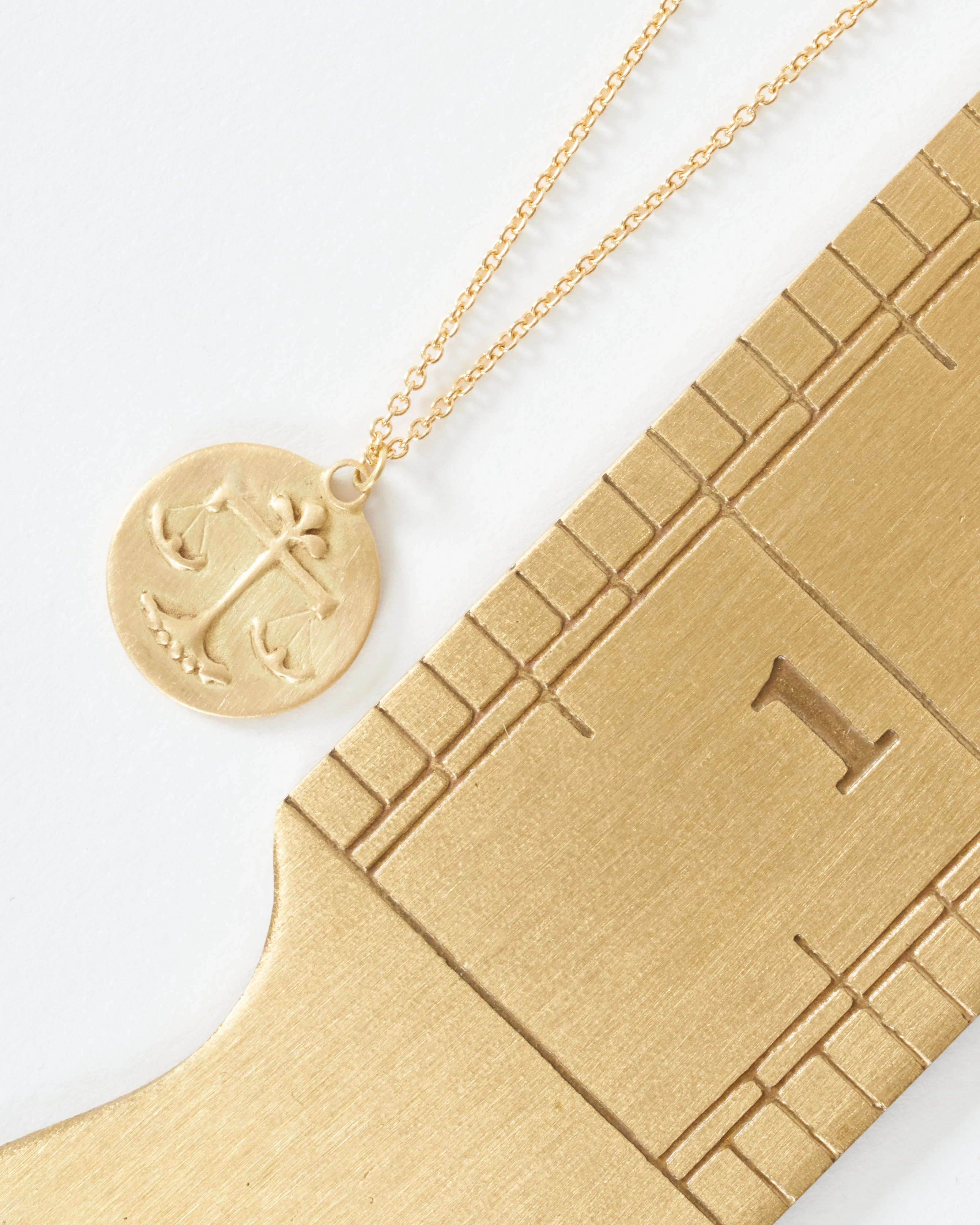 libra disc necklace