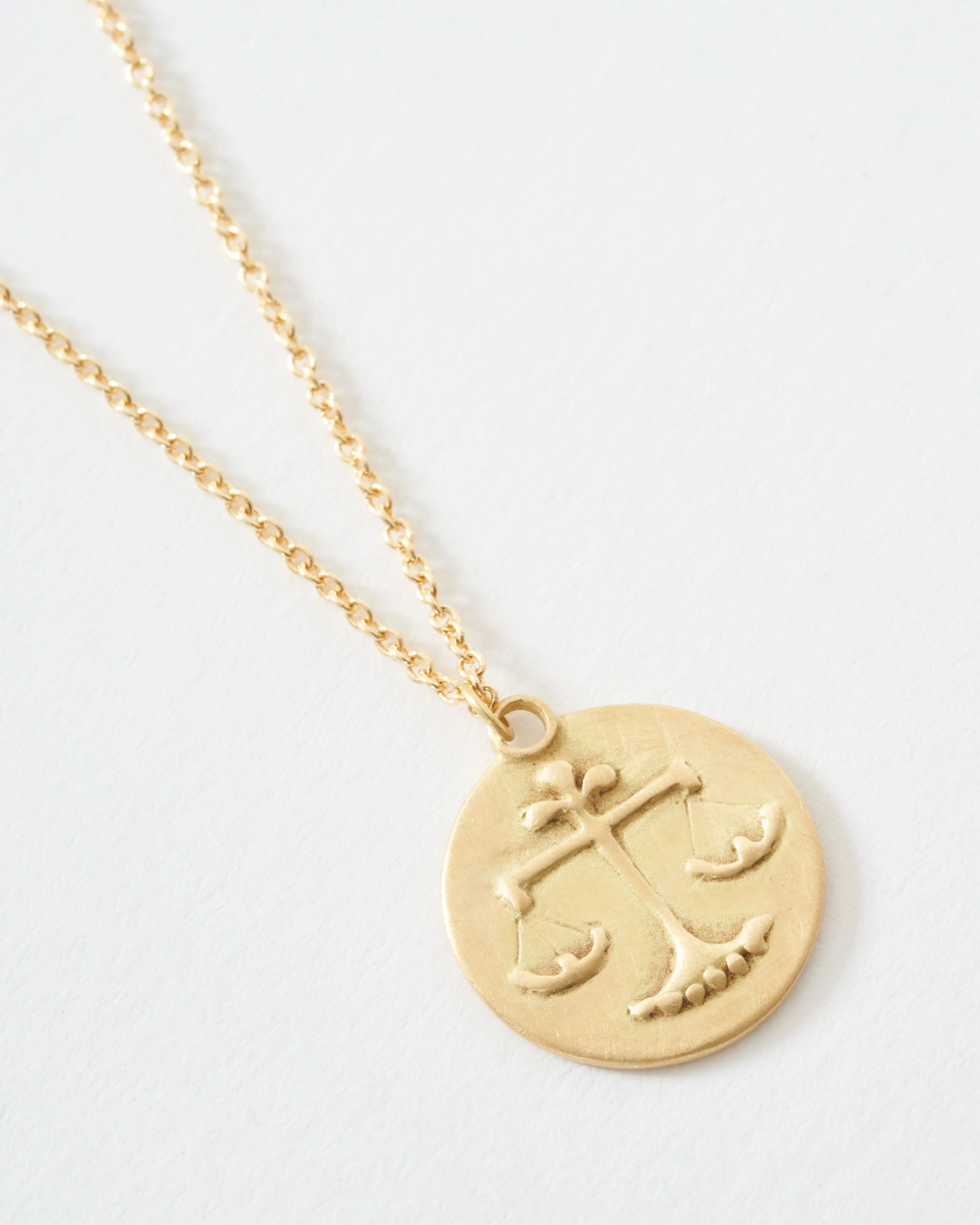 libra disc necklace