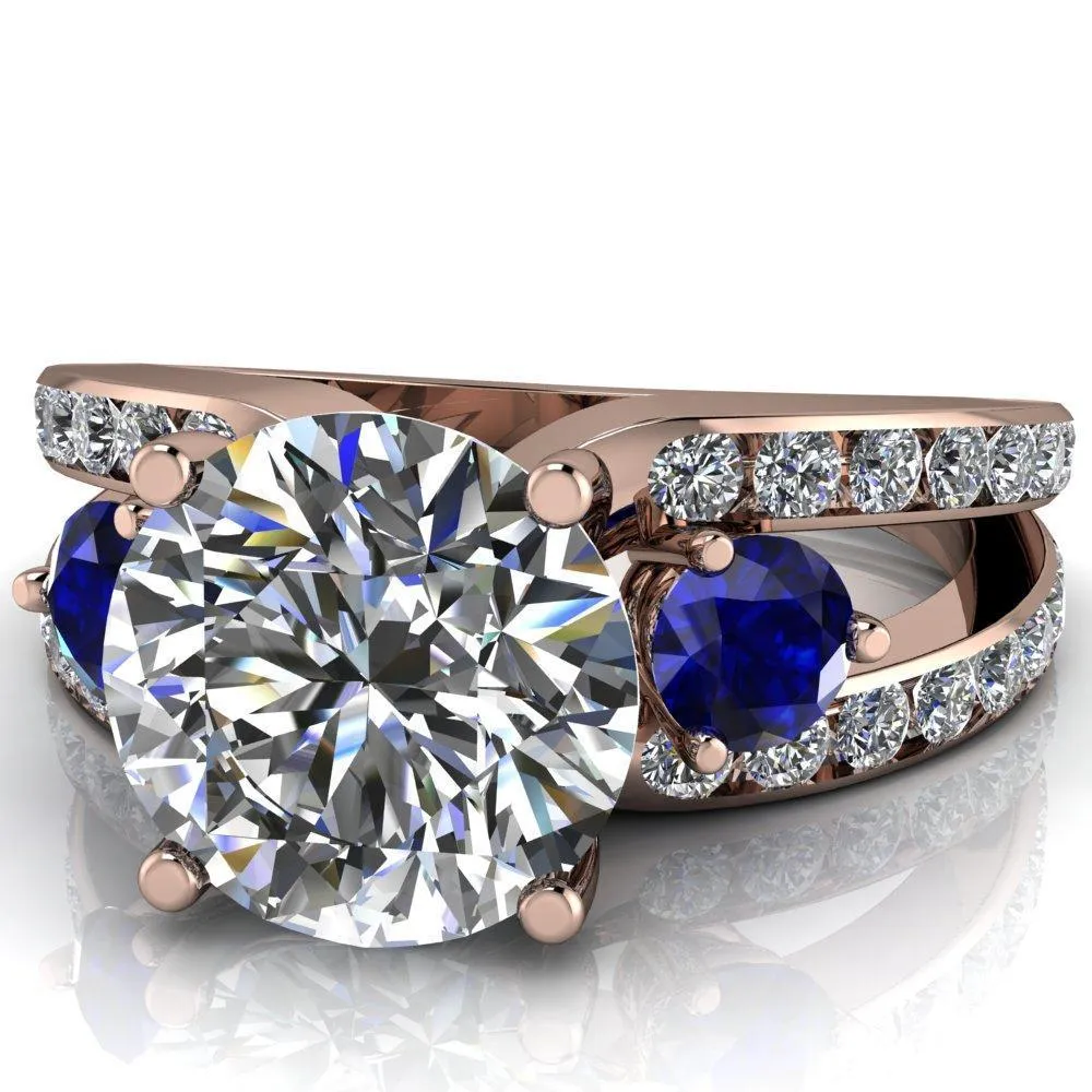 Orion Round Center Stone 2 Round Blue Sapphire Sides Split Shank Diamond Channel Set Ring
