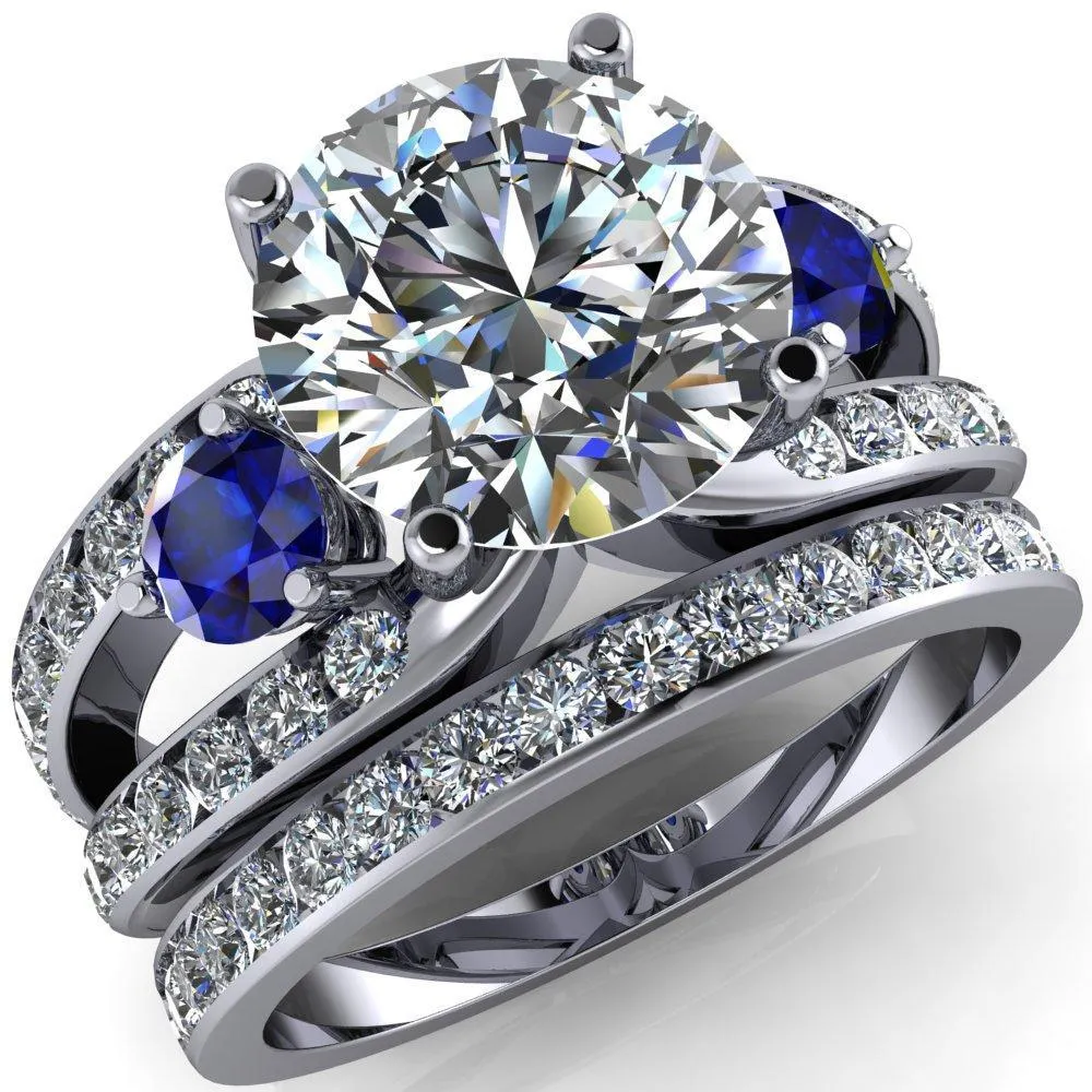 Orion Round Center Stone 2 Round Blue Sapphire Sides Split Shank Diamond Channel Set Ring