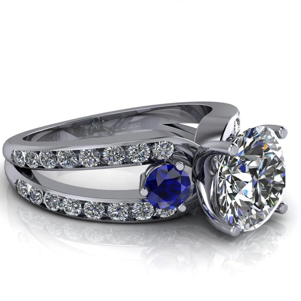 Orion Round Center Stone 2 Round Blue Sapphire Sides Split Shank Diamond Channel Set Ring