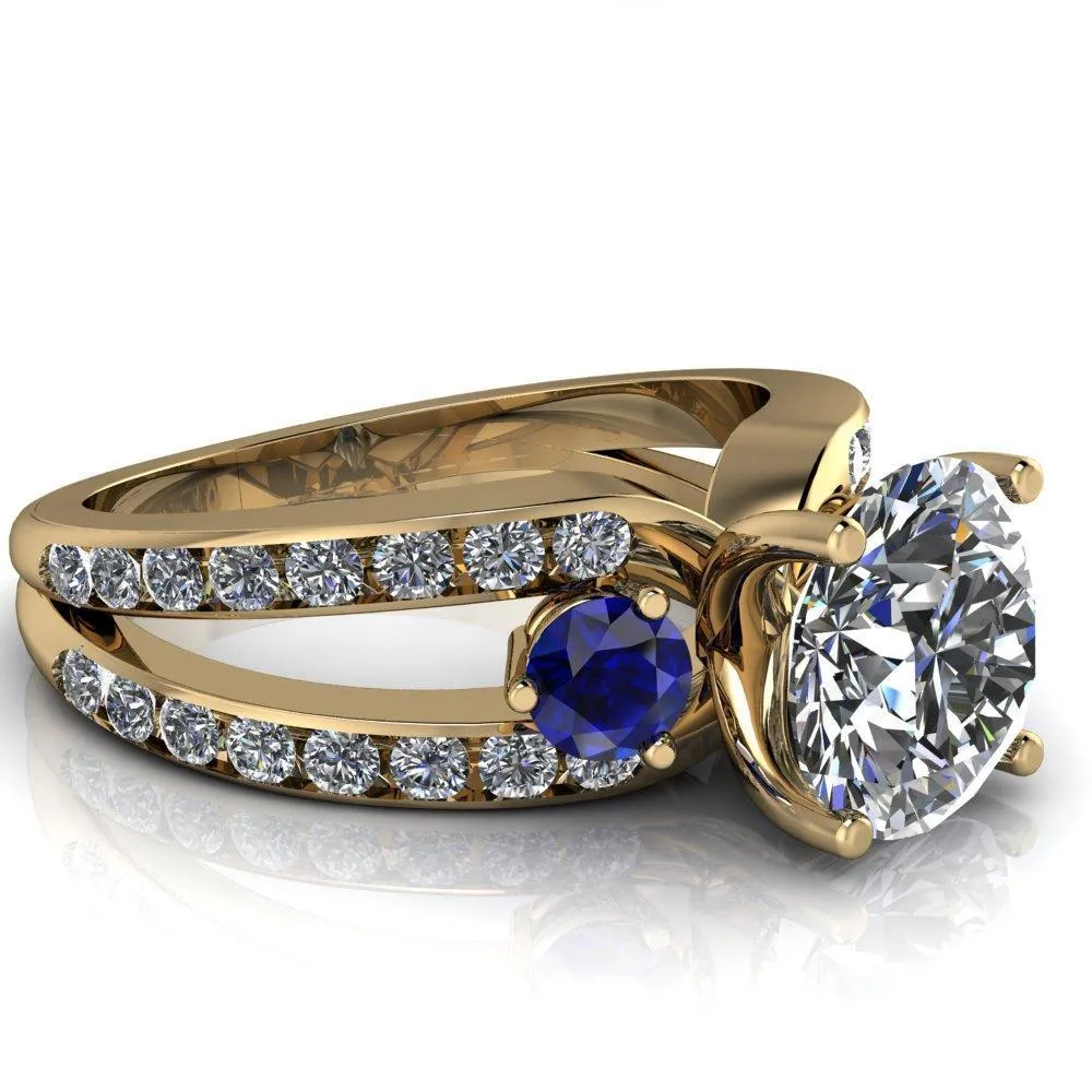 Orion Round Center Stone 2 Round Blue Sapphire Sides Split Shank Diamond Channel Set Ring