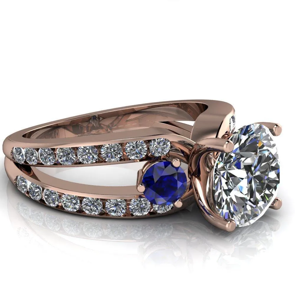 Orion Round Center Stone 2 Round Blue Sapphire Sides Split Shank Diamond Channel Set Ring
