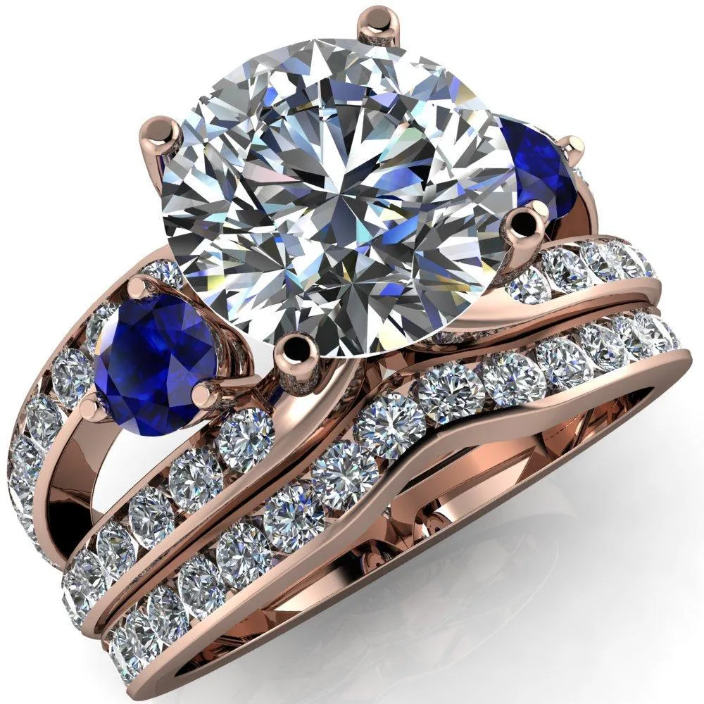Orion Round Center Stone 2 Round Blue Sapphire Sides Split Shank Diamond Channel Set Ring