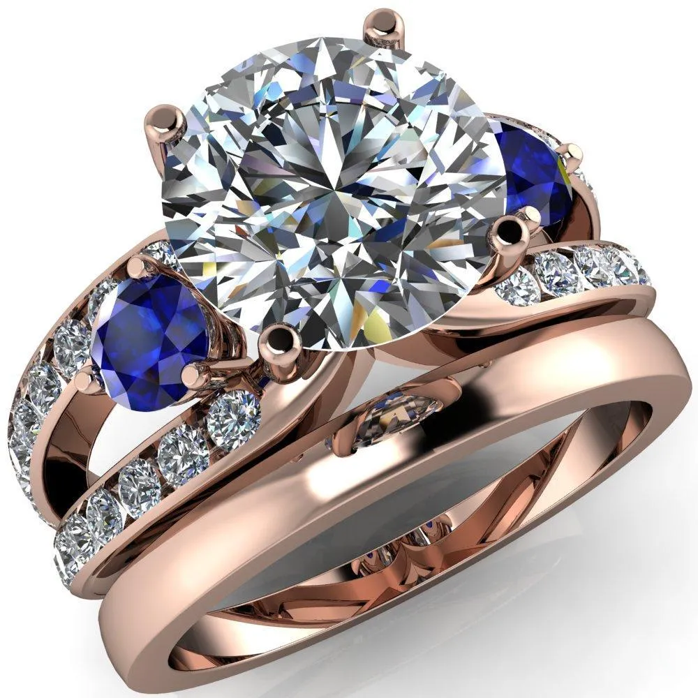 Orion Round Center Stone 2 Round Blue Sapphire Sides Split Shank Diamond Channel Set Ring
