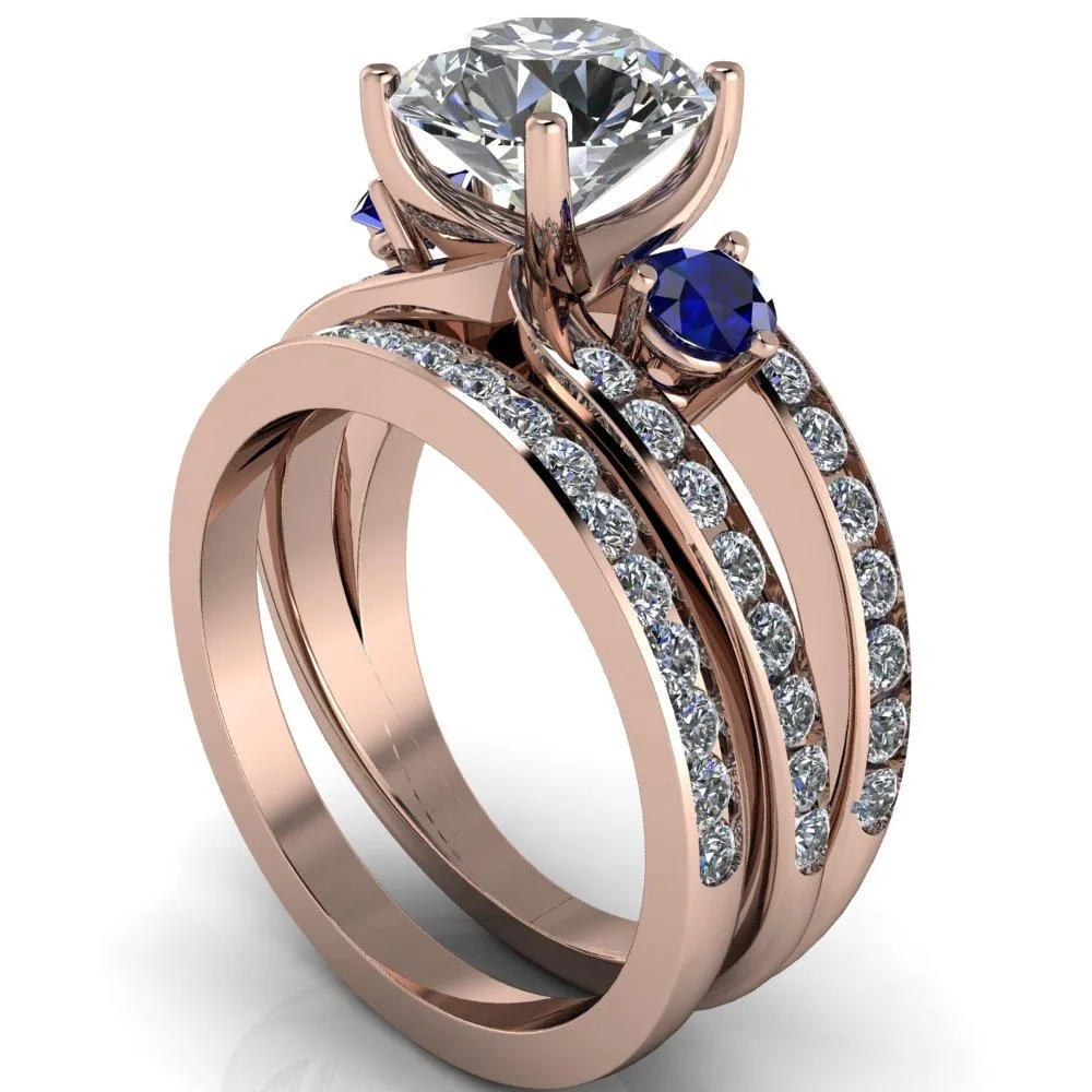 Orion Round Center Stone 2 Round Blue Sapphire Sides Split Shank Diamond Channel Set Ring