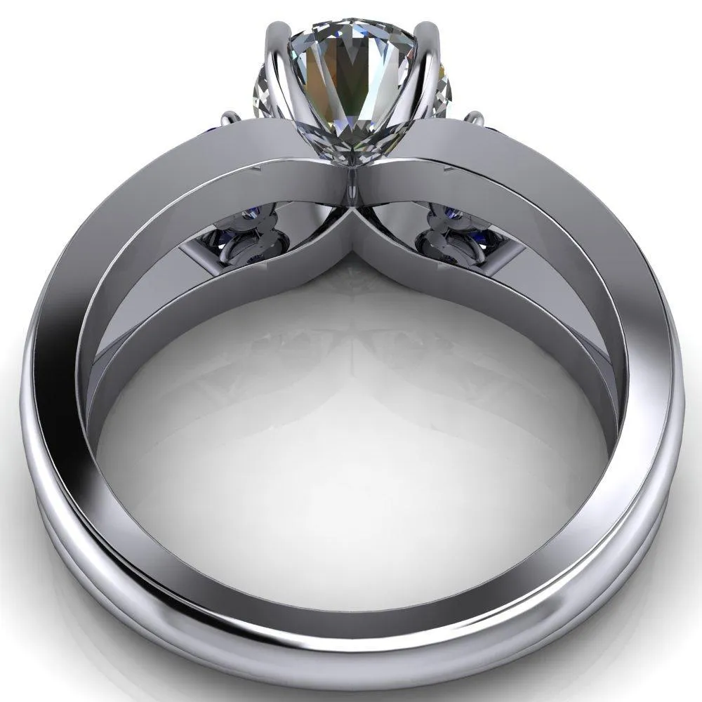 Orion Round Center Stone 2 Round Blue Sapphire Sides Split Shank Diamond Channel Set Ring