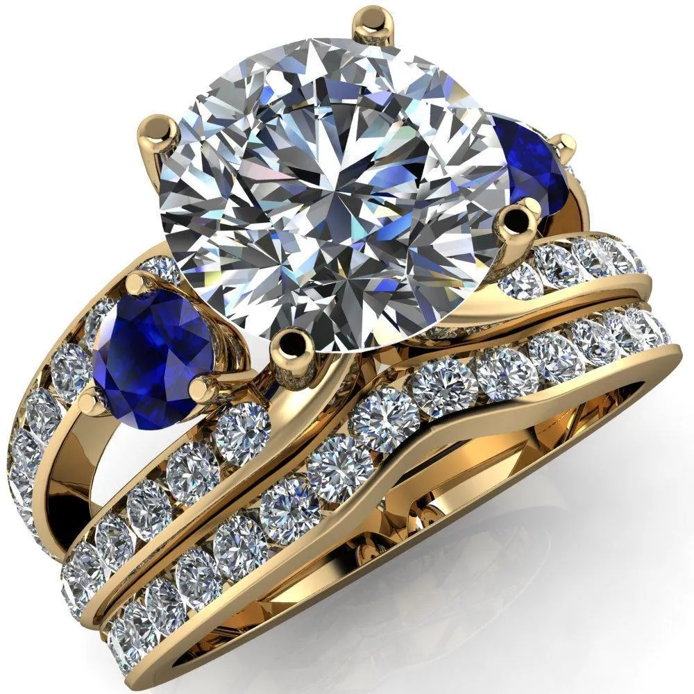 Orion Round Center Stone 2 Round Blue Sapphire Sides Split Shank Diamond Channel Set Ring