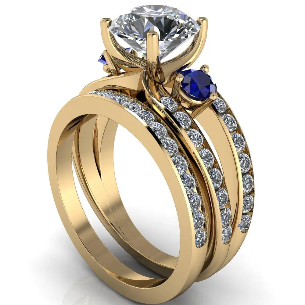 Orion Round Center Stone 2 Round Blue Sapphire Sides Split Shank Diamond Channel Set Ring