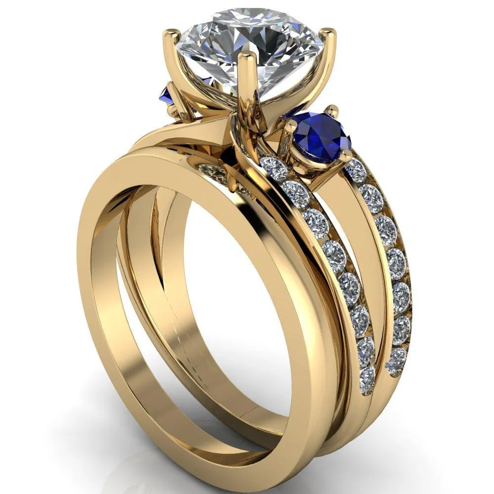 Orion Round Center Stone 2 Round Blue Sapphire Sides Split Shank Diamond Channel Set Ring