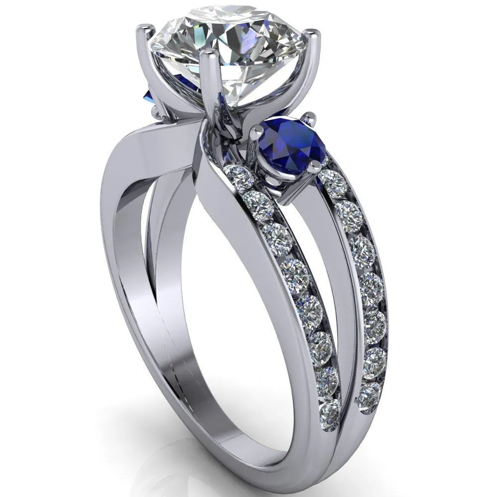 Orion Round Center Stone 2 Round Blue Sapphire Sides Split Shank Diamond Channel Set Ring