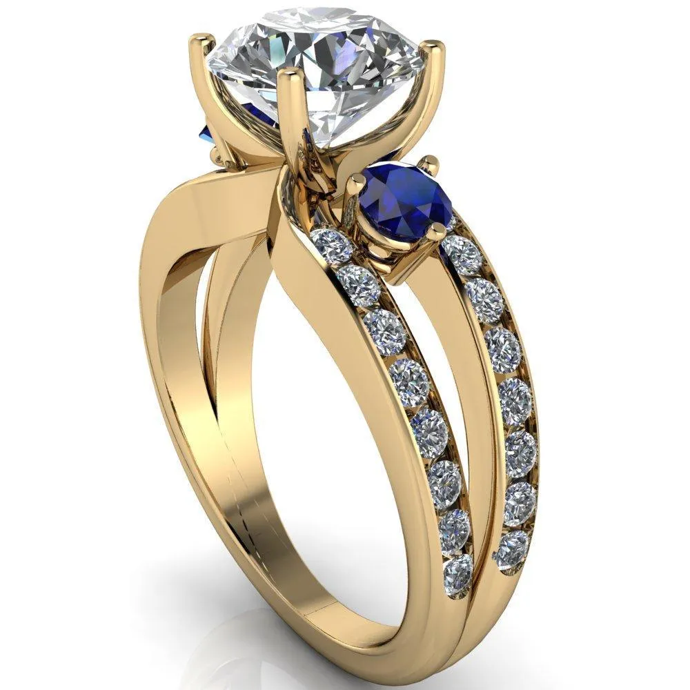 Orion Round Center Stone 2 Round Blue Sapphire Sides Split Shank Diamond Channel Set Ring