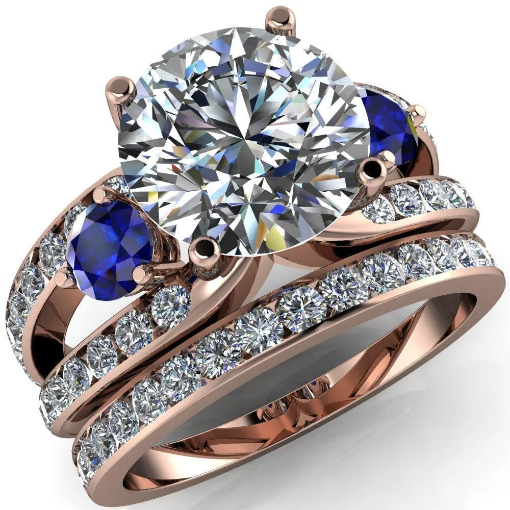 Orion Round Center Stone 2 Round Blue Sapphire Sides Split Shank Diamond Channel Set Ring