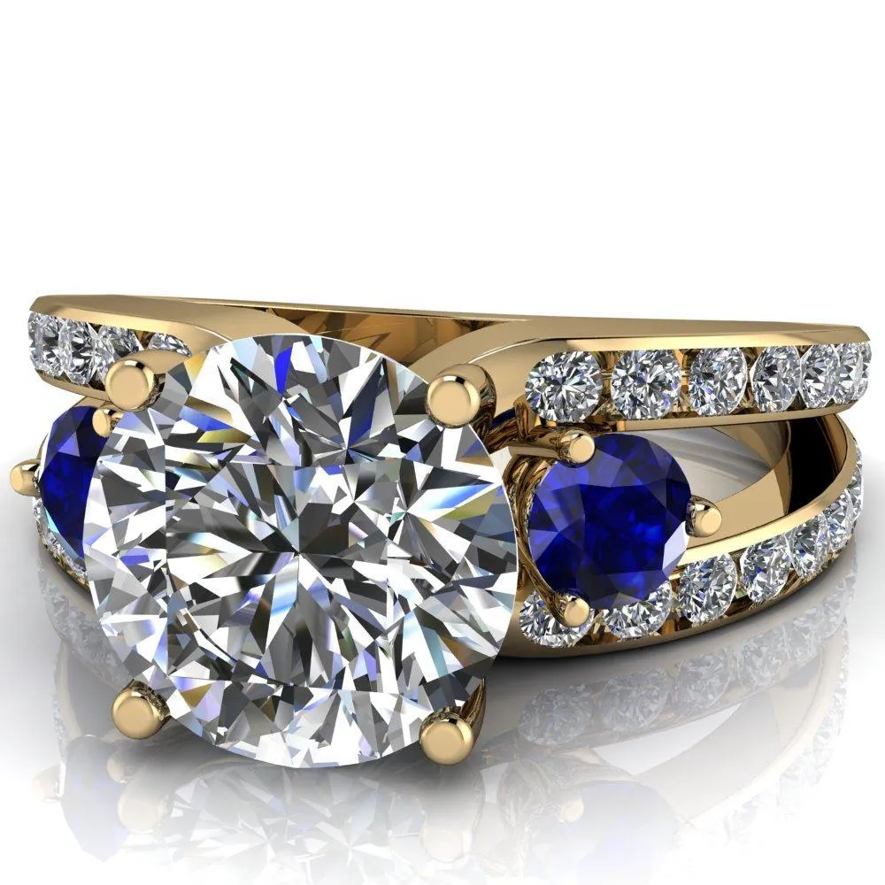 Orion Round Center Stone 2 Round Blue Sapphire Sides Split Shank Diamond Channel Set Ring