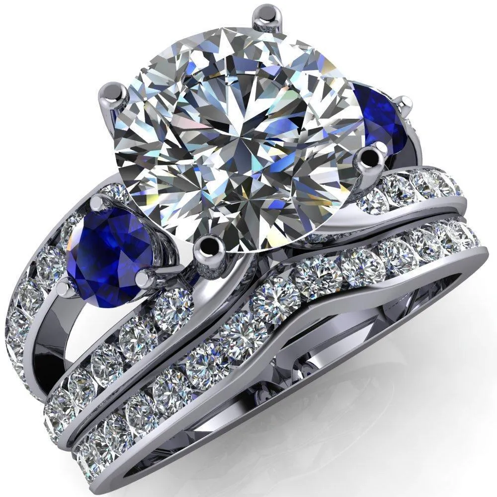 Orion Round Center Stone 2 Round Blue Sapphire Sides Split Shank Diamond Channel Set Ring