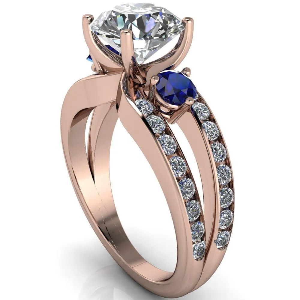 Orion Round Center Stone 2 Round Blue Sapphire Sides Split Shank Diamond Channel Set Ring