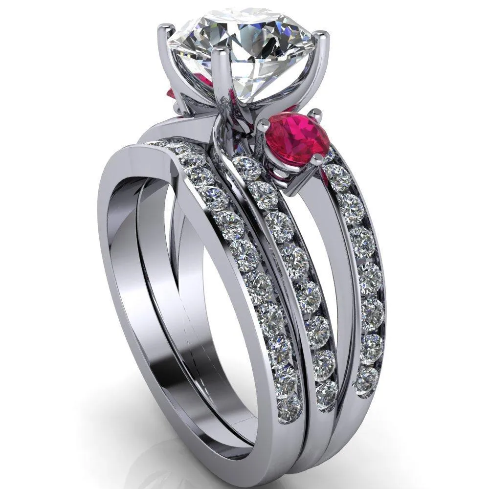 Orion Round Center Stone 2 Round Ruby Sides Split Shank Diamond Channel Set Ring