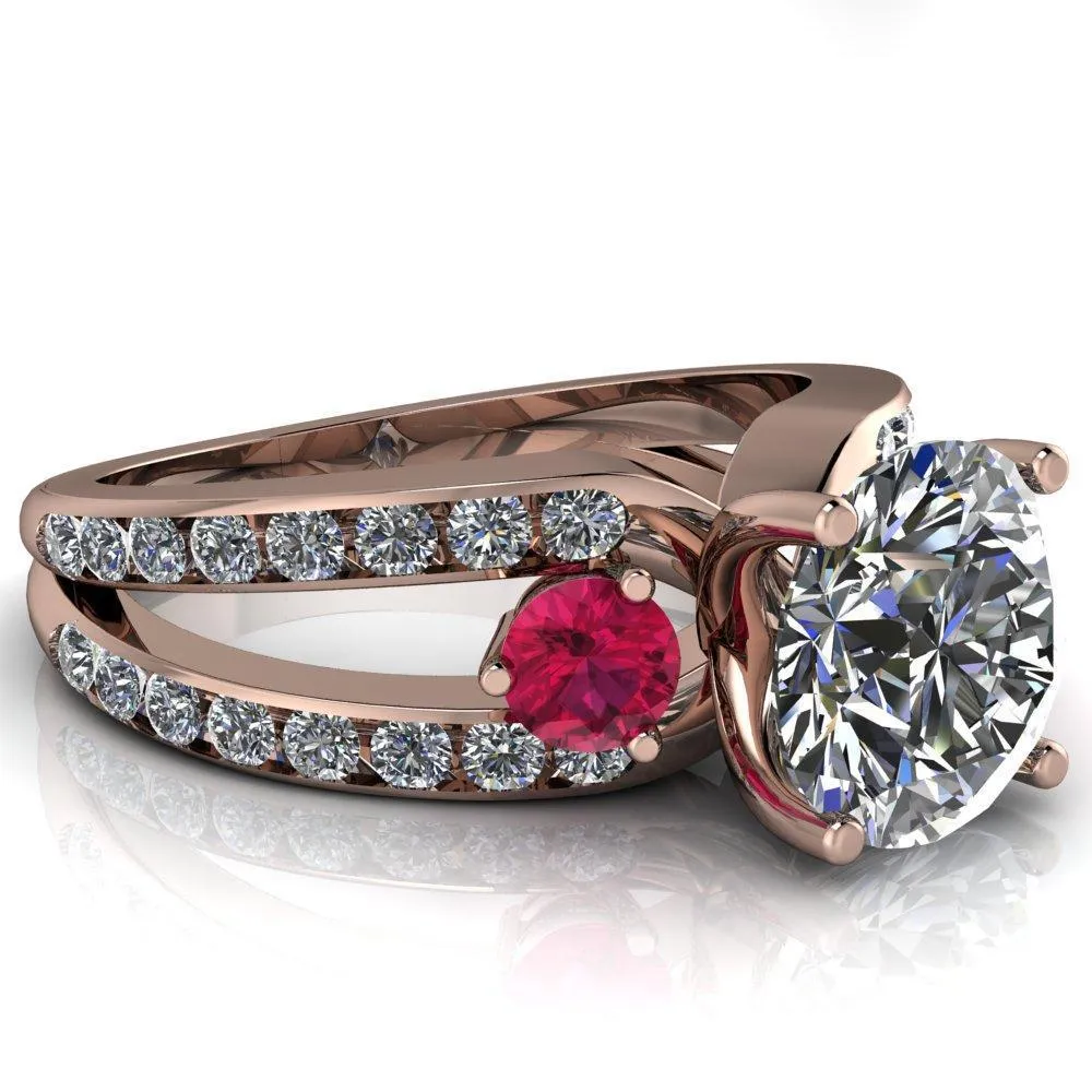 Orion Round Center Stone 2 Round Ruby Sides Split Shank Diamond Channel Set Ring