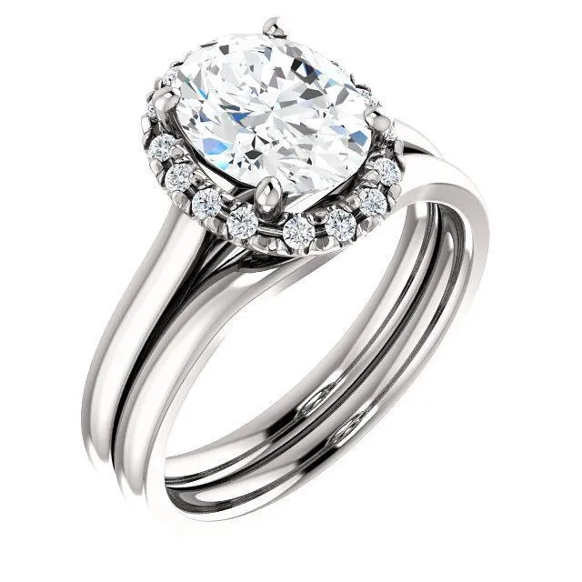 Oval Center Stone Diamond Accent Ice Halo French-Set Ring