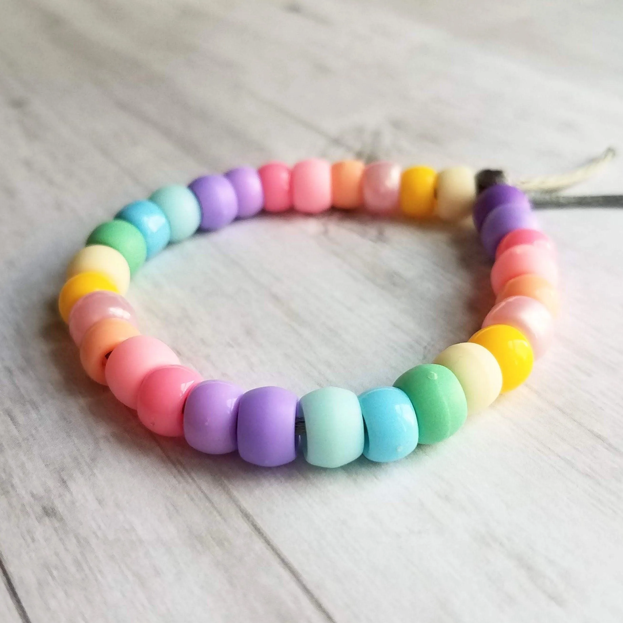 Pastel Rainbow Bracelet, pastel bead bracelet, tie on bracelet, cord bracelet, large crow beads, faux glass bead bracelet, chunky mix colors