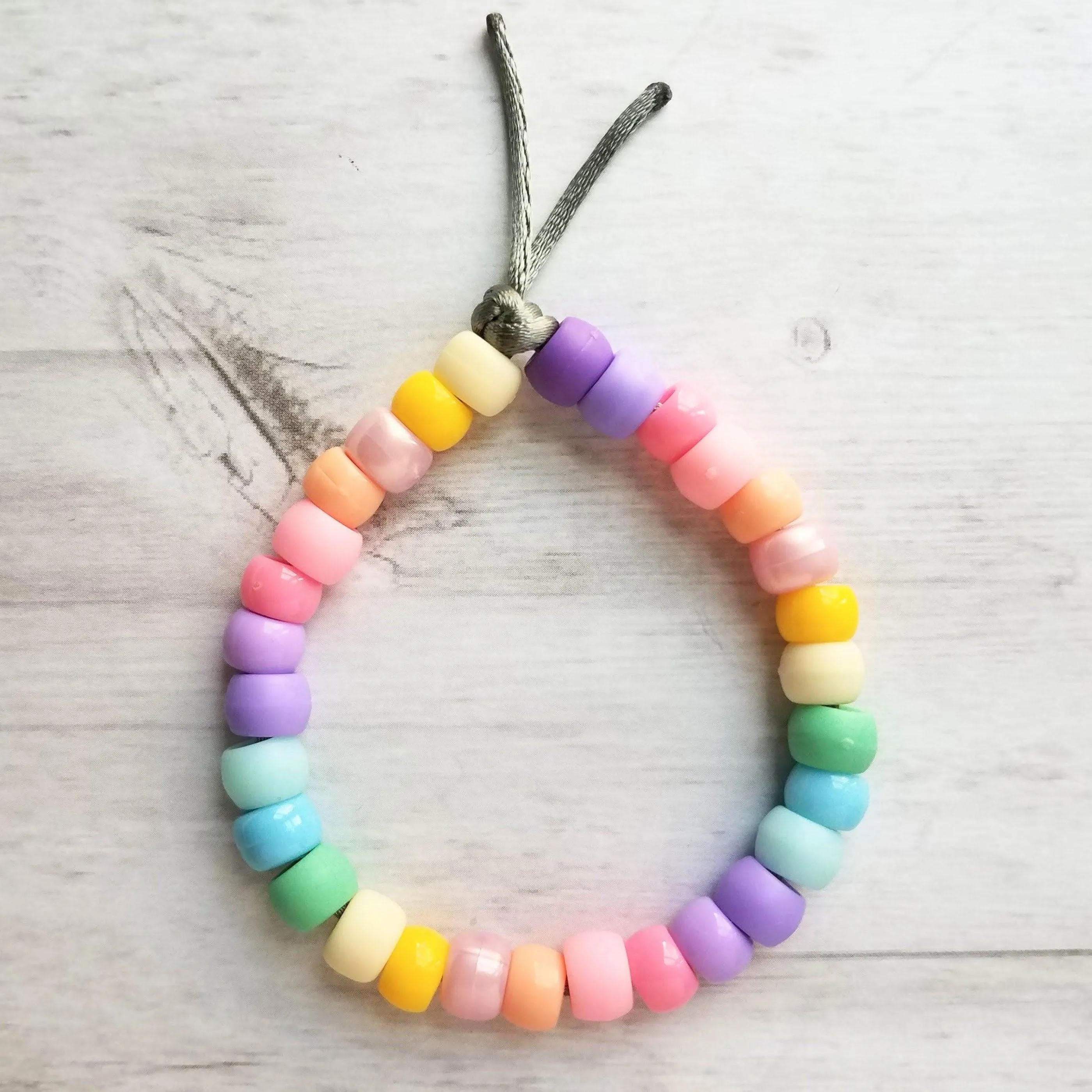 Pastel Rainbow Bracelet, pastel bead bracelet, tie on bracelet, cord bracelet, large crow beads, faux glass bead bracelet, chunky mix colors
