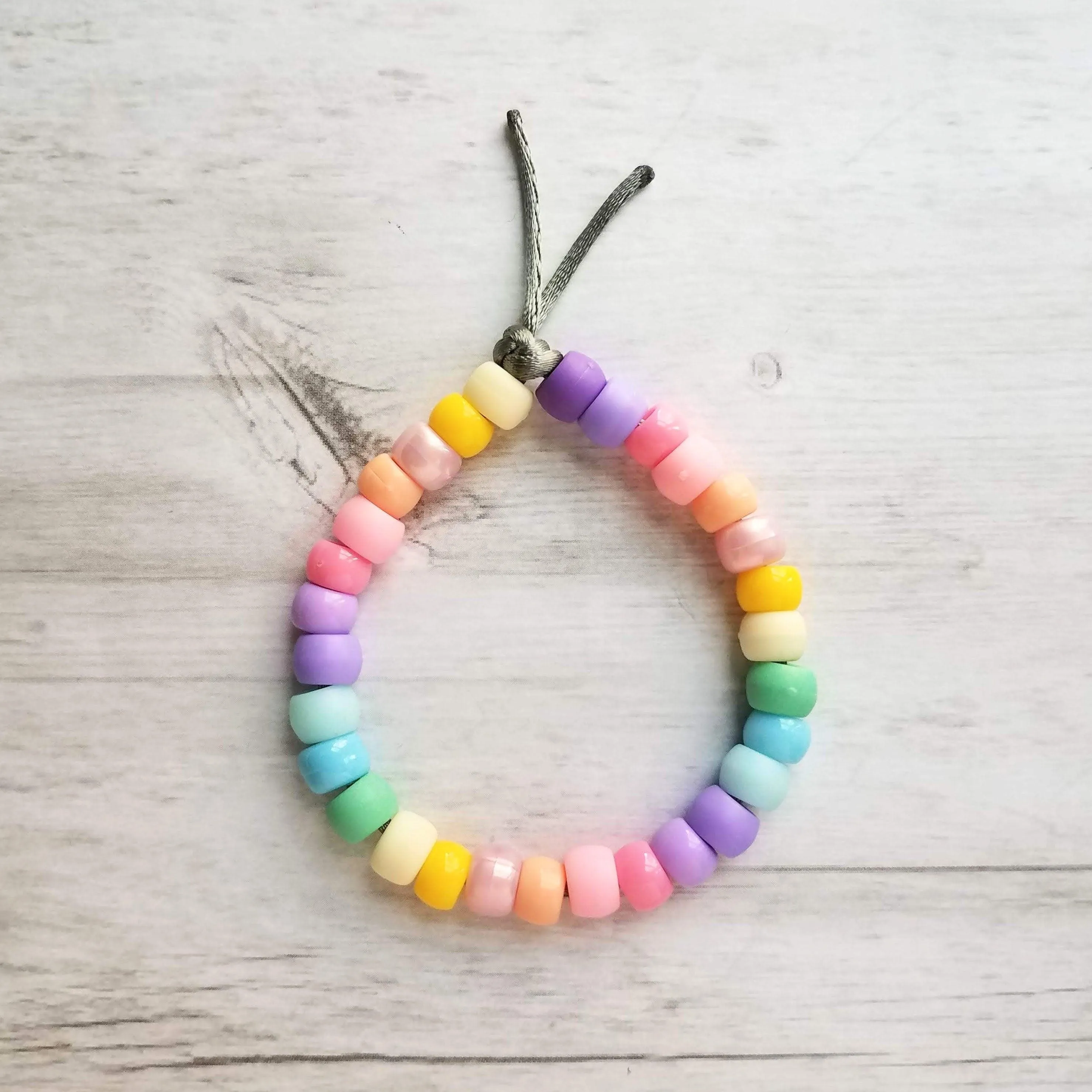 Pastel Rainbow Bracelet, pastel bead bracelet, tie on bracelet, cord bracelet, large crow beads, faux glass bead bracelet, chunky mix colors