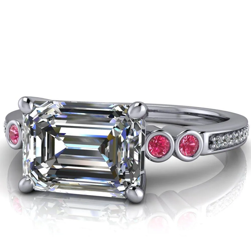 Philippa Emerald Moissanite 4 Pink Sapphire Sides 4 Prong Under Bezel Multi Stone Engagement Ring