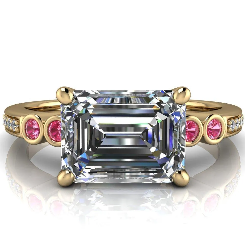 Philippa Emerald Moissanite 4 Pink Sapphire Sides 4 Prong Under Bezel Multi Stone Engagement Ring