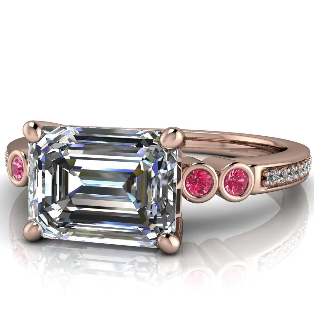 Philippa Emerald Moissanite 4 Pink Sapphire Sides 4 Prong Under Bezel Multi Stone Engagement Ring