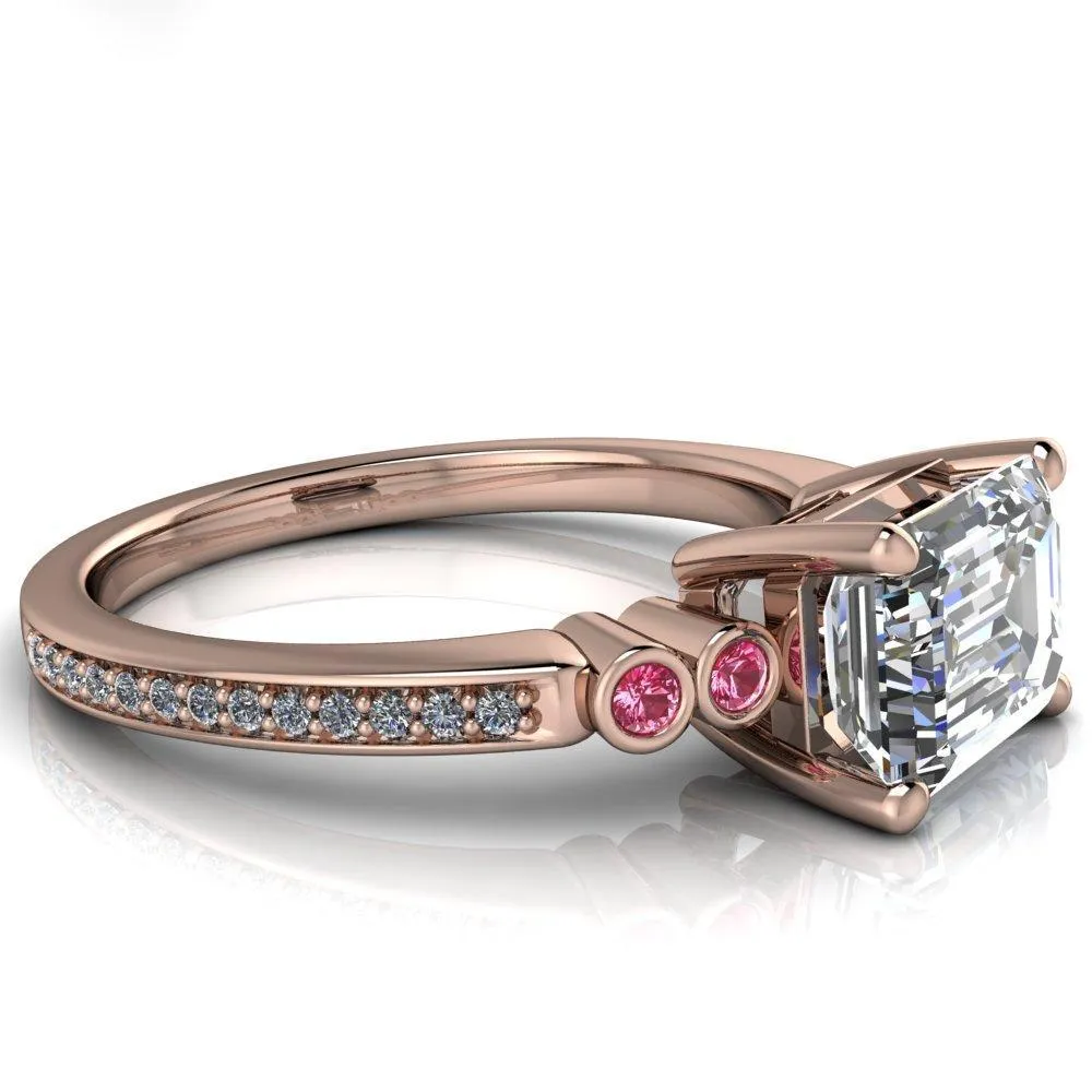 Philippa Emerald Moissanite 4 Pink Sapphire Sides 4 Prong Under Bezel Multi Stone Engagement Ring
