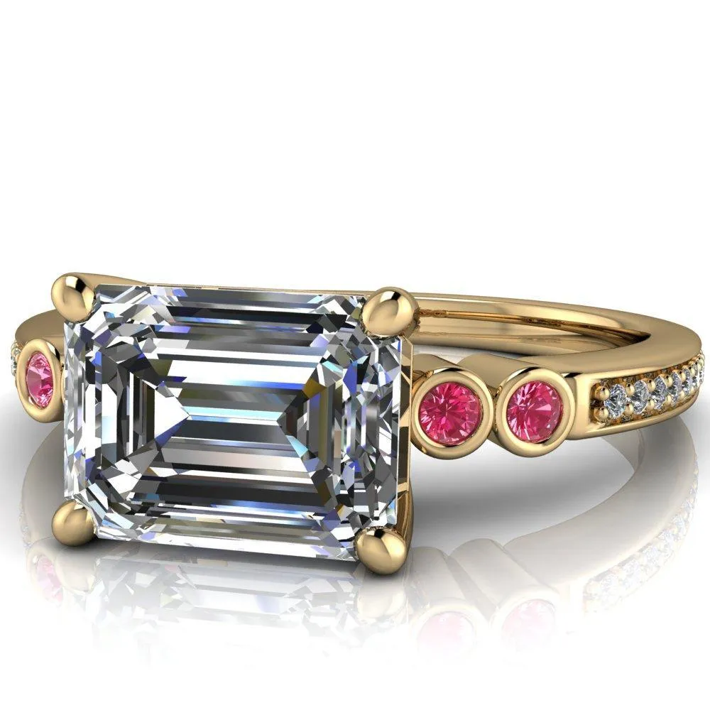 Philippa Emerald Moissanite 4 Pink Sapphire Sides 4 Prong Under Bezel Multi Stone Engagement Ring