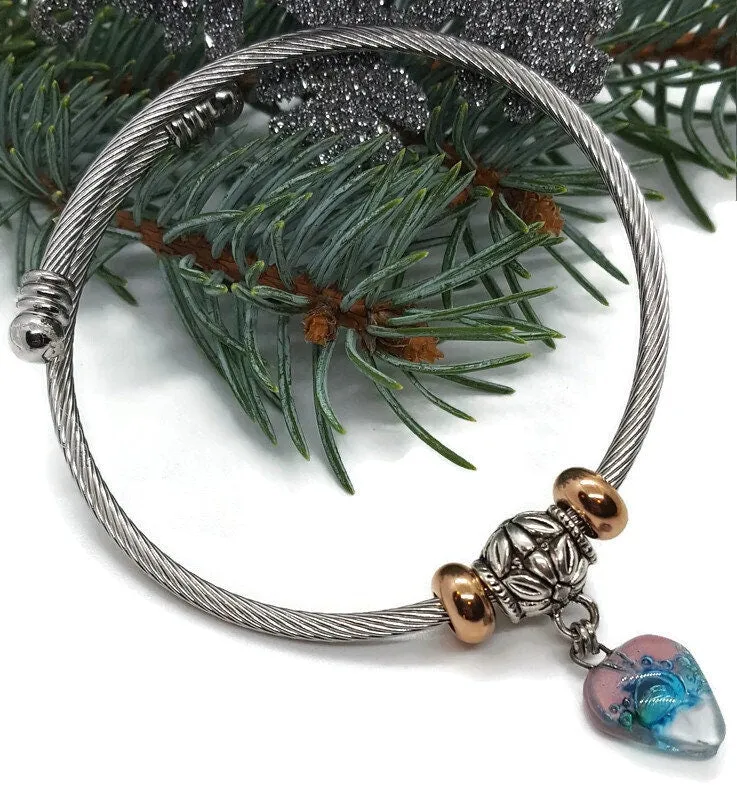Pink White and Turquoise Elastic Cable Bangle Twisted Stainless Steel Bracelet. Easy to put on stretch memory wire. One size fits most